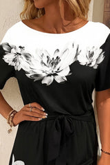 Kadın Tek Omuzu Açık çiçek Desenli Beli Kuşaklı Iki Iplik Mini Short Tulum